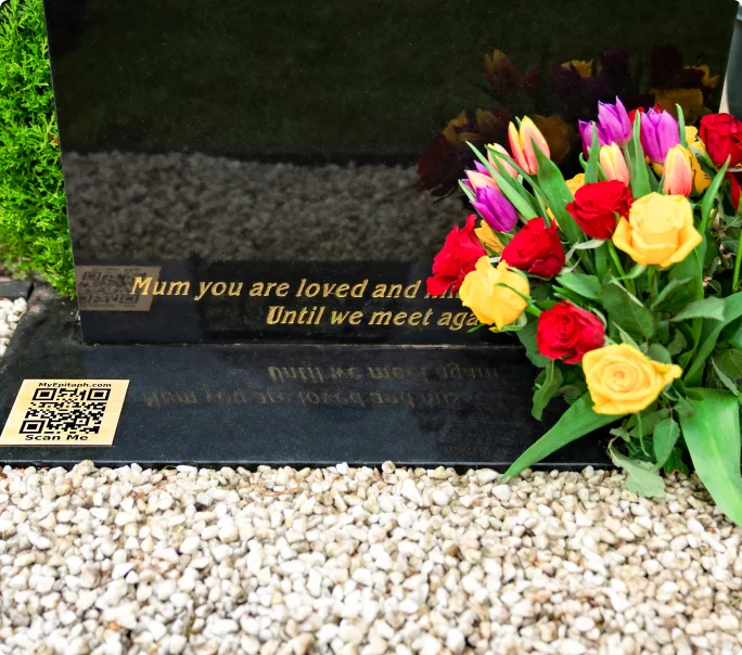 QR plaque on a memorial stone